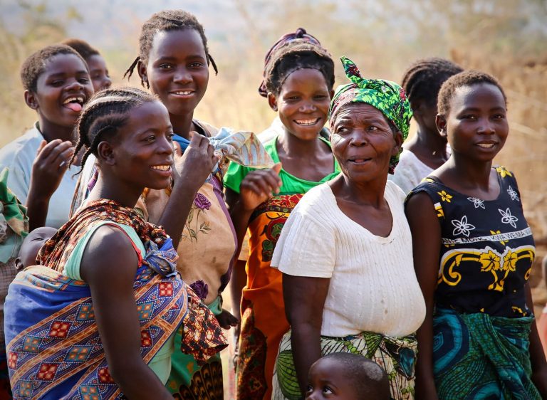 A group of women and children walking